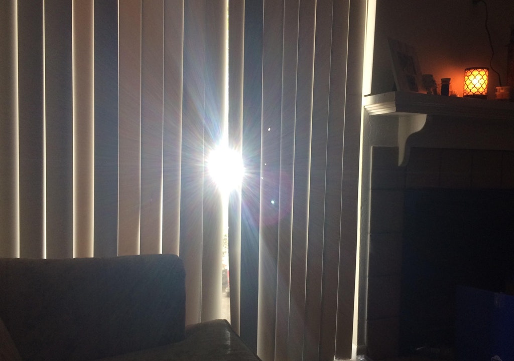mildly damaged vertical blinds that cause the sun to singe your retinas