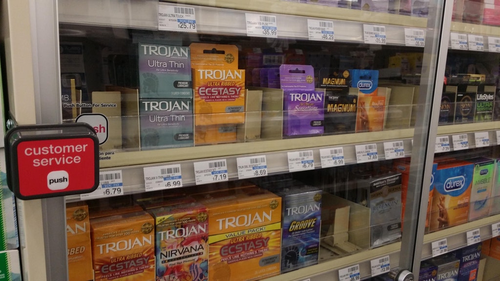 embarrassing configuration at a store in which you have to press a button for a representative to come by and open the rack for you to select your condoms, because it is not embarrassing enough already.