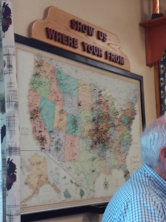 infuriating grammatical error of YOUR instead or you're on a wooden sign above a map for people to push pin and indicate where they are visiting from.