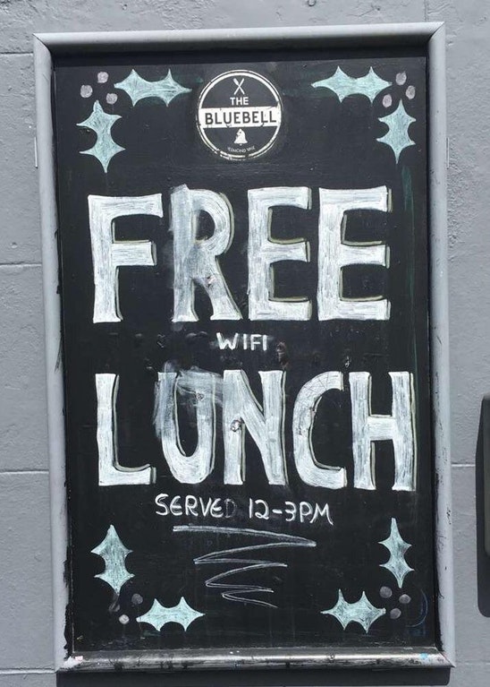 cleverly deceitful sign that says FREE LUNCH but upon closer inspection is just free WIFI for those eating lunch at the restaurant 