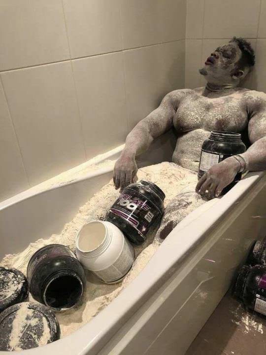 man in a tub full of weight gainer