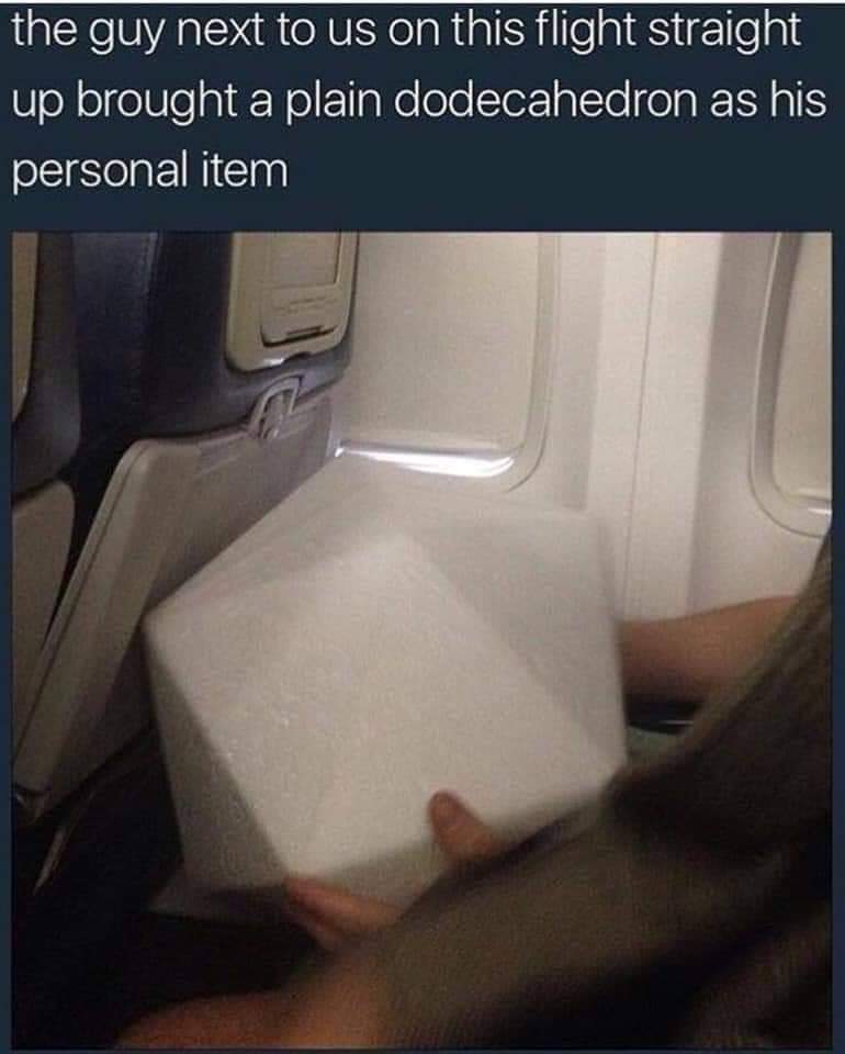 another hand touches the beacon - the guy next to us on this flight straight up brought a plain dodecahedron as his personal item
