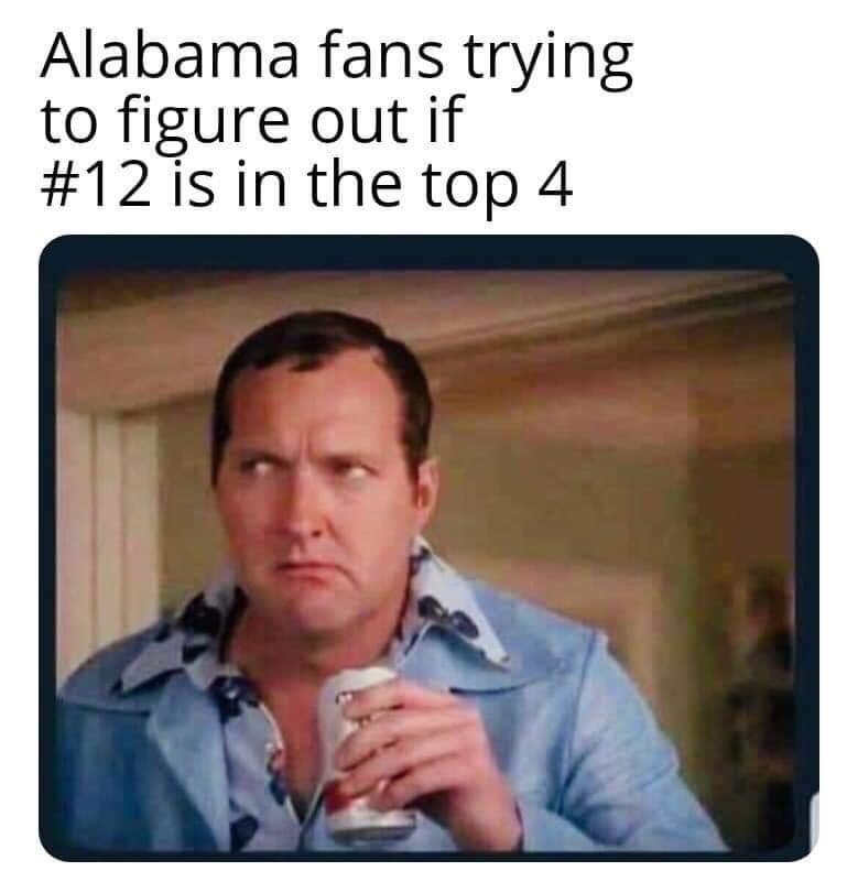 photo caption - Alabama fans trying to figure out if is in the top 4