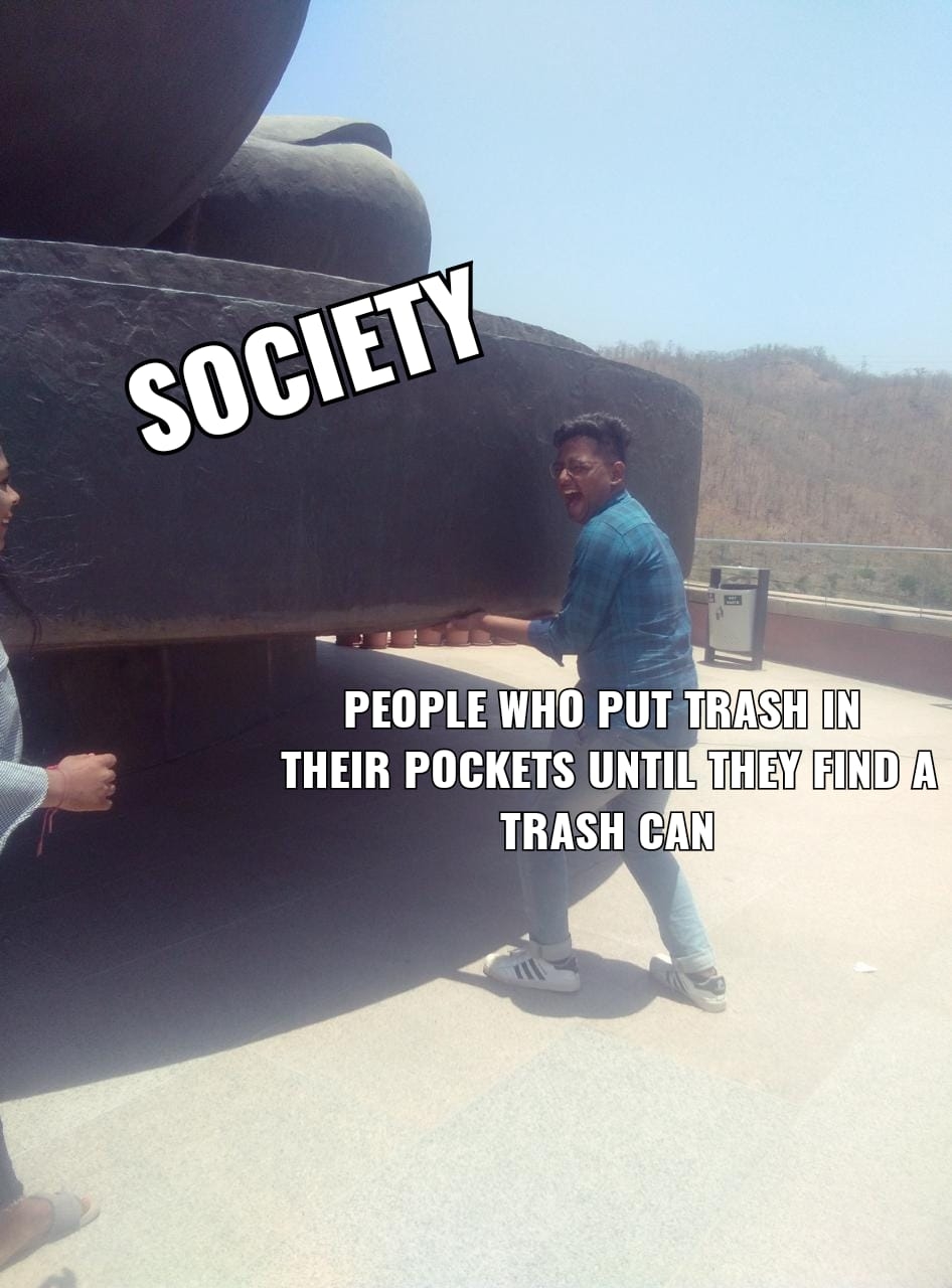 asphalt - Society People Who Put Trash In Their Pockets Until They Find A Trash Can