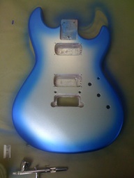Second coat of iridescent electric blue to create a 'silverburst' effect.