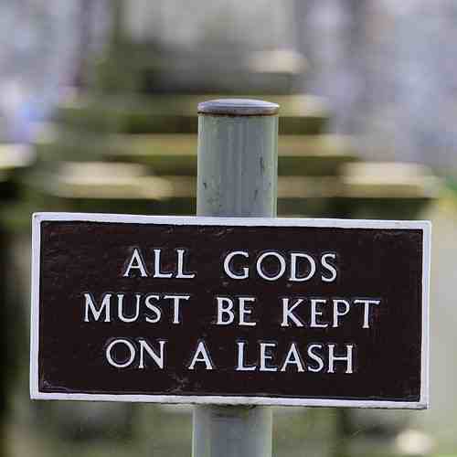 signage - All Gods Must Be Kept On A Leash