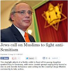 photo caption - Jews call on Muslims to fight anti Semitism Pubt 100ST The dat a tertin abbin ton of his young daughter sparked fury in Germany, with some Jewish groups saying they feed a rise in antisemitic behavior and esting for the cour 's age Muslim 