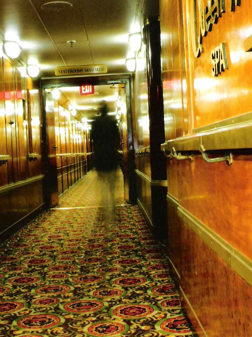 The Queen Mary is one of the most haunted ships known anywhere. This photo was taken by a 78-year-old tourist who was simply snapping a photo of the vestibule. What he ended up with would become the best ghostly image ever caught on the QM.