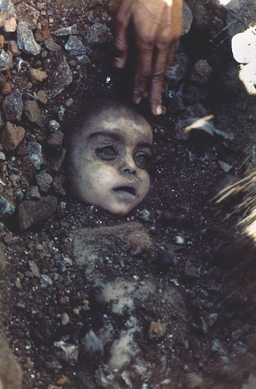 This is a tragic, real photo of a child killed by the poisonous gas leak of the Union Carbide plant disaster of 1984.