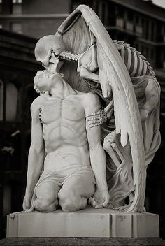 The beautiful work of art, "Kiss of Death," at Barcelona's  Poblenou Cemetery.
