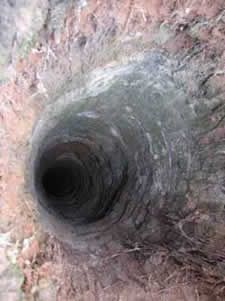 Beginning in the 1980s, all kinds of strange holes just like this one have been discovered in Russian forests. Anyone brave enough to descend into one only finds nothing. No construction equipment, noises, or any other sign of work has ever been reported in the area.