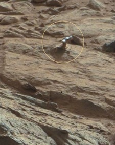 NASA's Curiosity rover sends one photo of an unexplained shiny object on Mars.