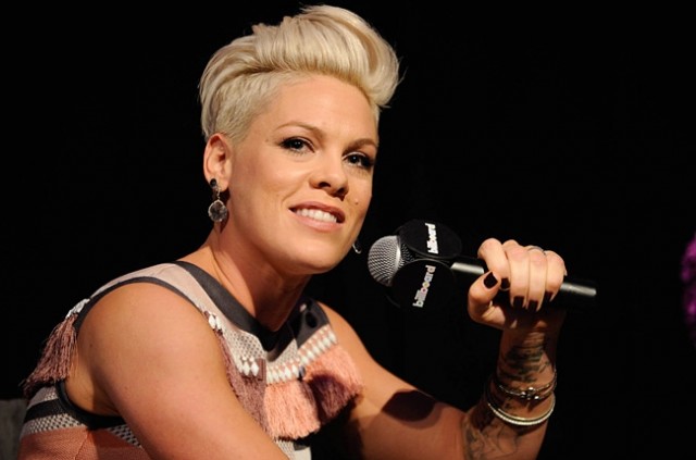 Over a reference to a P!nk song, an Australian teenager, who tweeted: "Pink I'm ready with my Bomb. Time to blow up #RodLaverArena Bitch", was ousted from a concert containing over 1,000 fans. Naturally, authorities did not know - or care - that the context of the tweet was in direct reference to a song that didn't even belong to him, and used his profile pic to find him in the crowd at the arena. Witnesses attest to over 20 guards surrounding this boy, who was then arrested.
