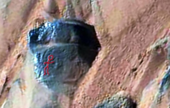 Another Curiosity rover photo piqued the interest of a UFO blogger in Belgium. This guy claims a Martian rock has a sideways petroglyph on it, similar to hieroglyphics found on columns in ancient Egypt.