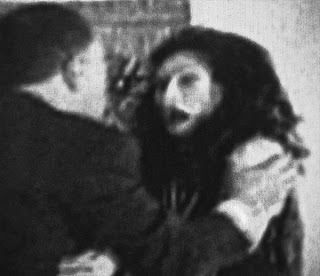 This is a still from a film said to have real paranormal phenomena occurring right before your eyes. "Return to Babylon", a silent film, is currently under study by researchers and even cinema experts. Apparently there is spontaneous morphing of this actor's face into that of hideous creatures and dead people - impossible in film at the time.