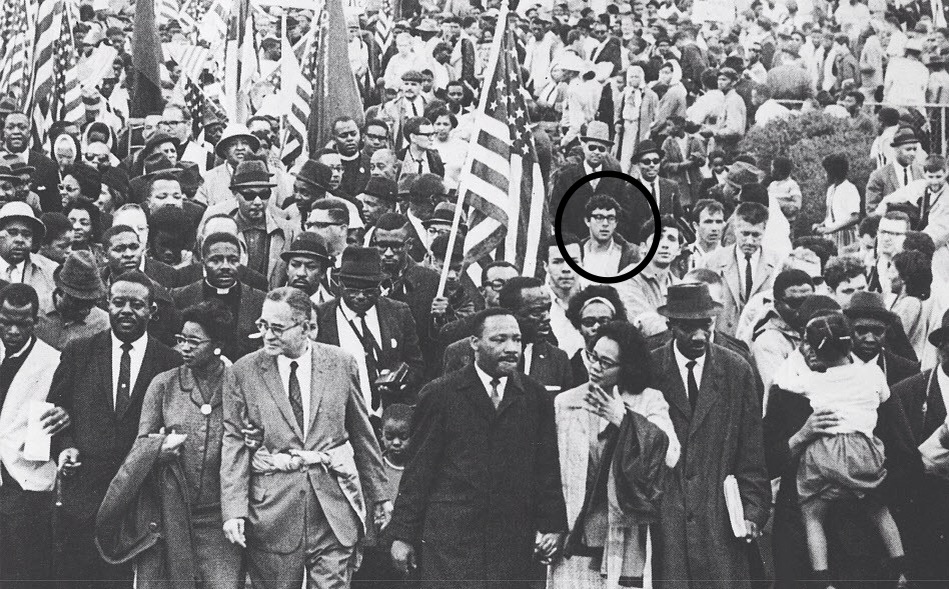 Sanders marching with Martin Luther King, Jr.