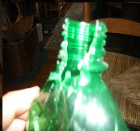 MD bottle, hard plastic caved in...