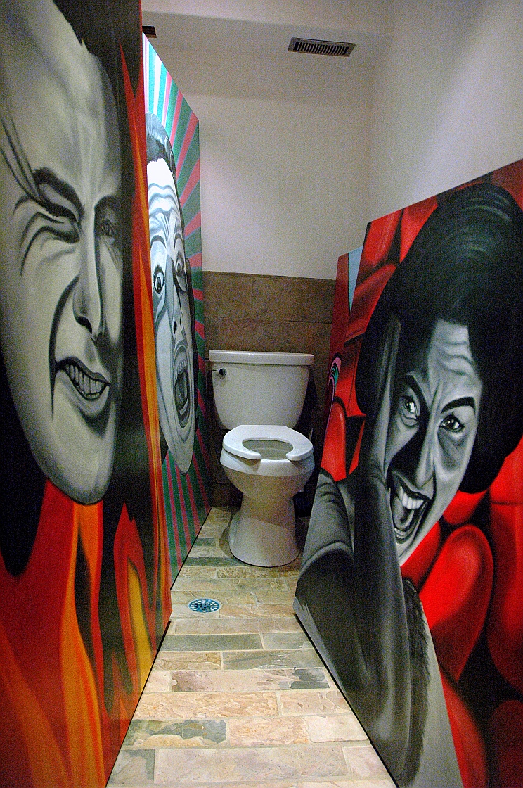 My original bathroom studio of terrifying and crappy art...