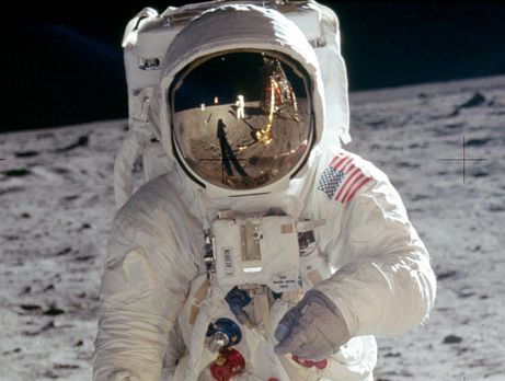 only two astronauts walked on the moon at a time, yet in photographs such as this one where both are visible, there is no sign of a camera. So who took the picture? 