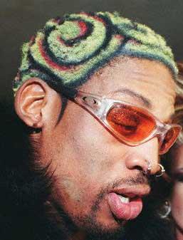 Dennis Rodman rocked a variety of wacky hairstyles but his outrageous personality have made his hair seem tame by comparison. 