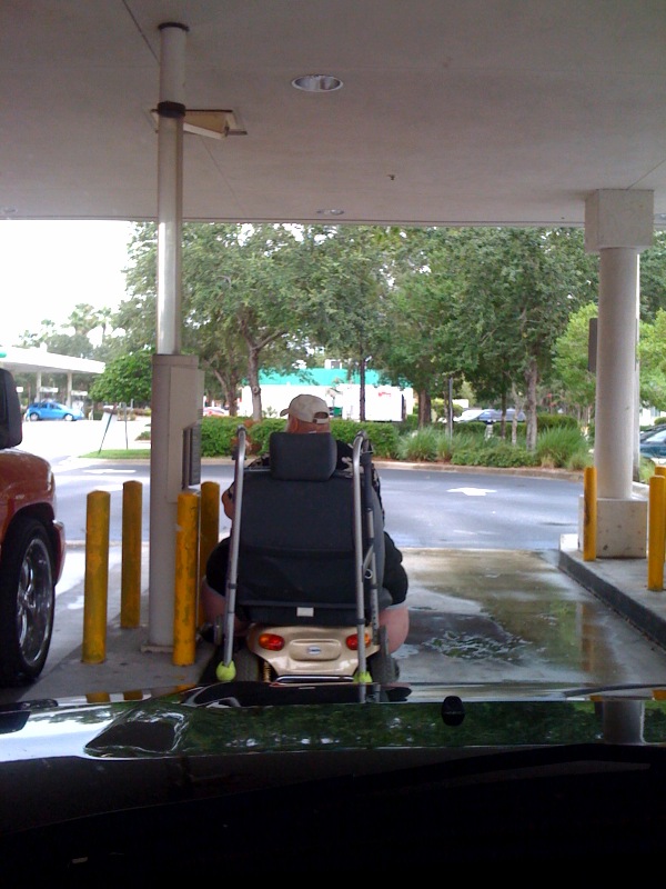 found Santa going through the drive through at the bank in FL. He must be on vaction, and missing his normal ride.