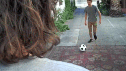 Super slow mo soccer ball to the face.