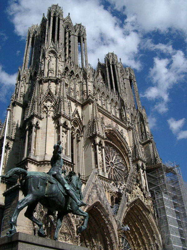 Rheims Cathedral, France - Photo of the statue of a man on a horse in front of the cathedral