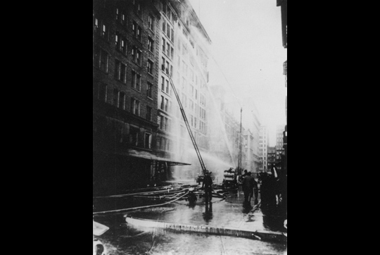 Fire-fighters could not extinguish the flames or reach the trapped workers, many of whom fell to their deaths from the windows attempting to escape the blaze. Photo source: International Ladies' Garment Workers' Union Archives, Kheel Center, Cornell University