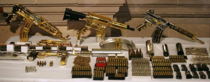 More Gold machine guns and pistols - most were never fired, just held for collection value