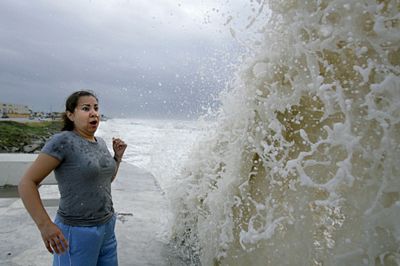 Sylvia Renteria startled her first waves up like a wall due to super beaches in Ike Galveston, Texas USA, on December 12.