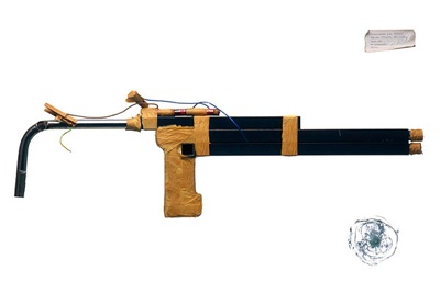 shotgun made of batterys bedpost wood lightbulb