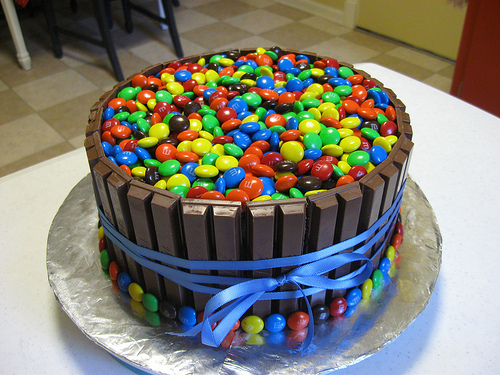 Trippy pictures of a birthday cake made out of kit-kats and M&M's