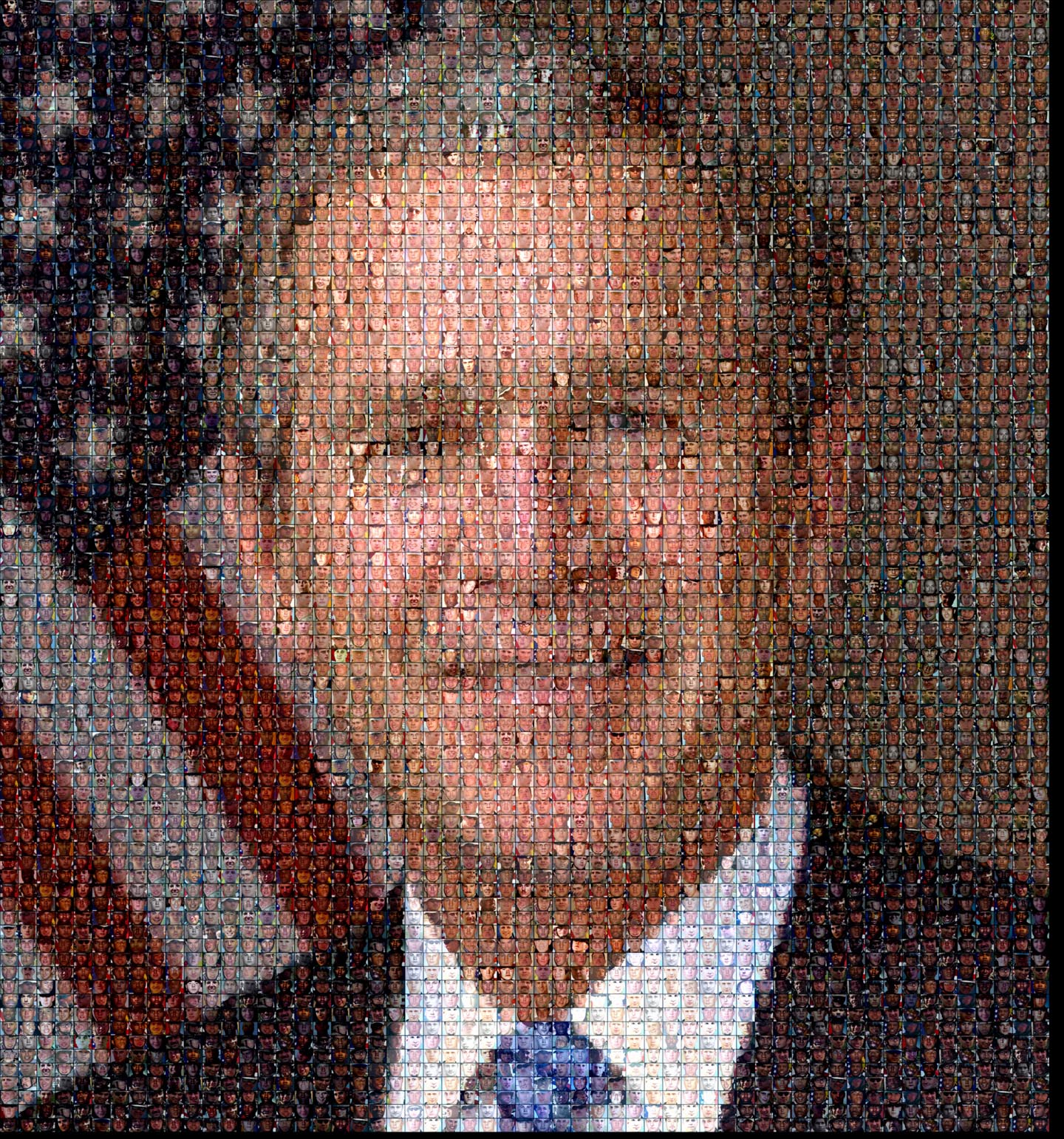 Enlarge to see the picture is made up of photos of the American casualties in the war. For every death in Iraq, George W. Bush is responsible. 