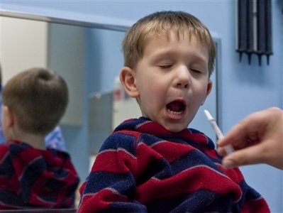A kid and his flu shot reaction