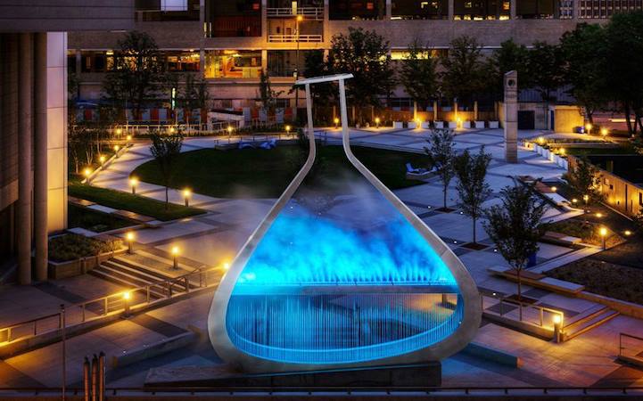 Artists Bill Pechet and Chris Pekar designed an amazing giant flask that is on display at Winnipeg's Millennium Library Plaza. It drizzles water and creates a fog and the lights even change color.