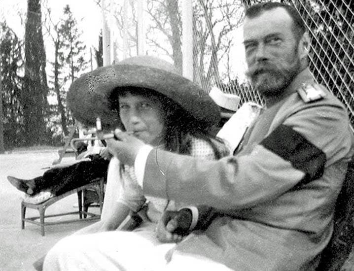 Anastasia shares a smoke with her father, Tsar Nicholas II two years before their assassination in 1916.