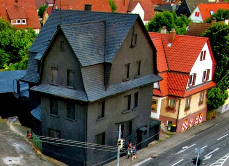 Before it stood out so much, this building was slated for demolition in 2008. Artists Erik Sturm and Simon Jung took that opportunity to give it a very gothic makeover.
