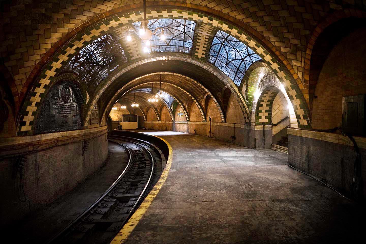 This NYC subway station used to service thousands of commuters each day. It is located near City Hall, and can still be seen by the Number Six train as it passes through the now defunct station.