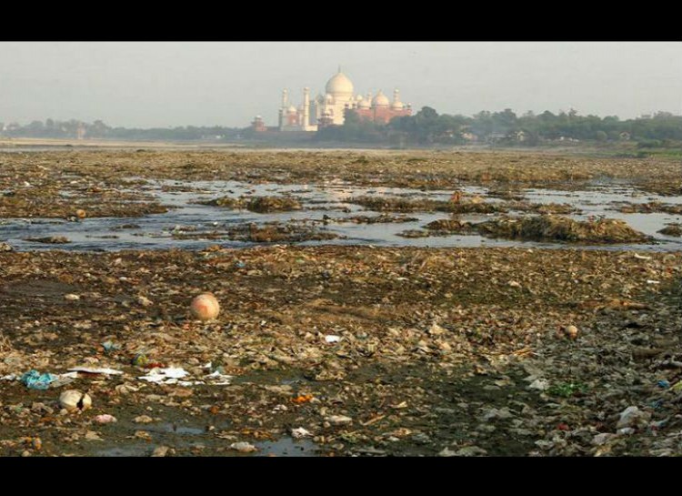 Looking at the Taj Mahal from this angle, however, tells a different story about the modern India.