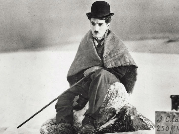 "THE GOLD RUSH" (1925) While still in the silent age of cinema, slapstick comedies dominated the big screens, with the legendary Charlie Chaplin serving as the reigning king of the genre.