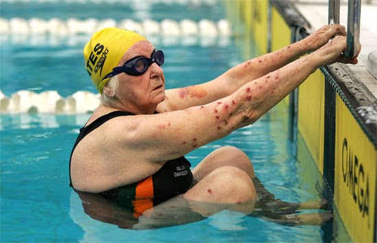 Another swimmer, 98-year-old Margo Bates, prepares for the 100-meter backstroke.
