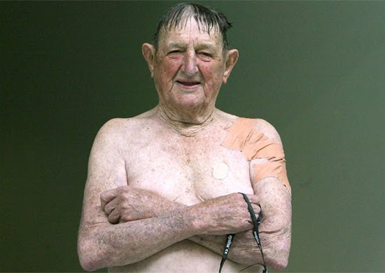 Jack Mathieson, aged 91, poses after swimming in the 800-metre freestyle. 
