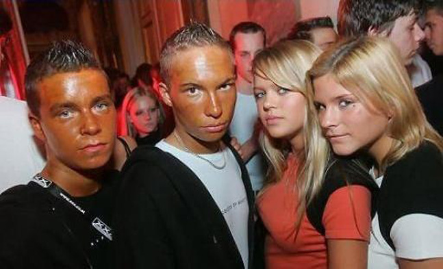 These kids look like two prime Florida oranges. I love that one of them couldn’t even make it up to their hairline. I can see two blonde chicas who are going to have some serious smears on their pillows tonight.