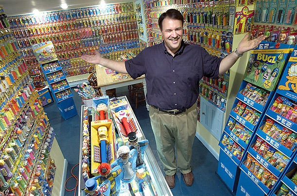 The basement of Ron Hood's home in Lewiston, Maine, has been fitted to display his collection of Pez dispensers and merchandise. He currently has more than 3,000 Pez items but noted in a 2008 interview that "my collection is considered very small in Pez-collector circles."
