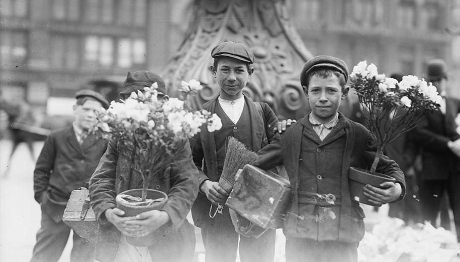 Boys after buying Easter flowers in Union Square, New York, April 1908