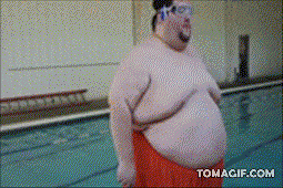 gifs - large man goes into a pool and the splash of water hits a whole city