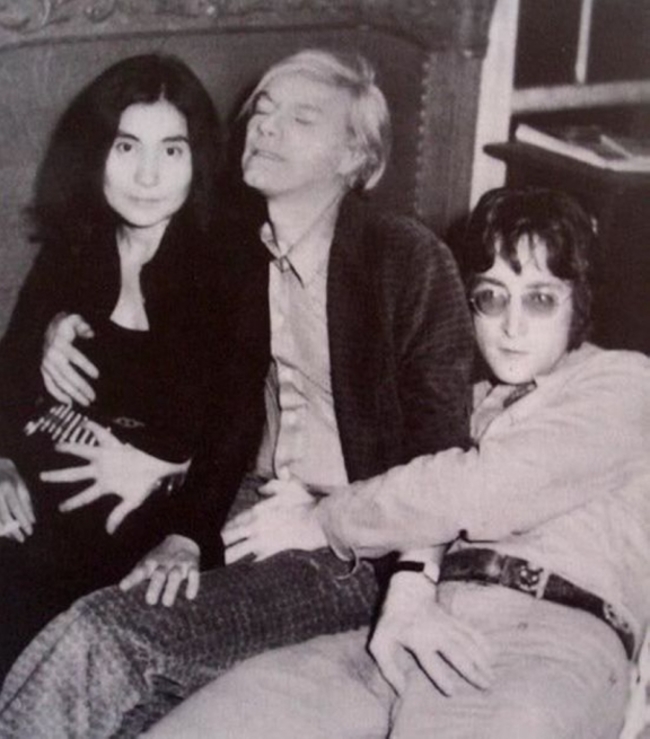 Yoko Ono, Andy Warhol and John Lennon posing for a silly photo.