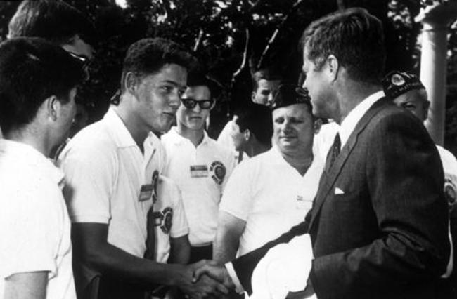 A young Bill Clinton meeting President John F. Kennedy in 1963.