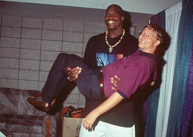 Bill Gates learning how large Shaq is.