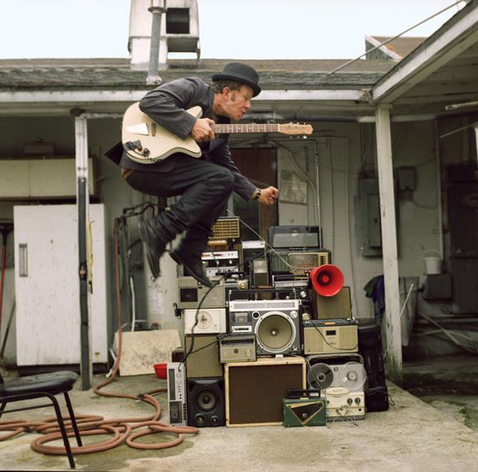 Tom Waits jumping around - probably euphoric about the badass music he is capable of writing.